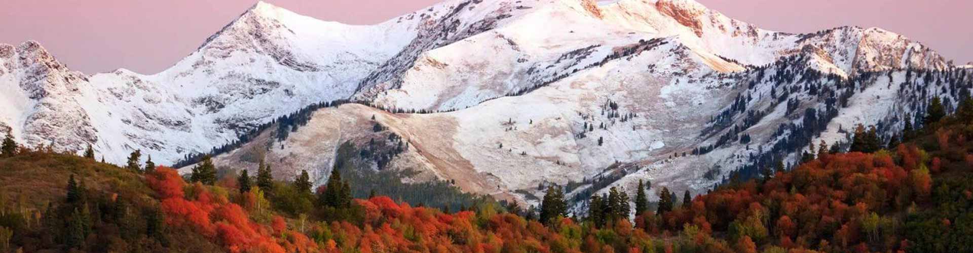 a mountain range with mountains with XE Park City's luxury transportation.